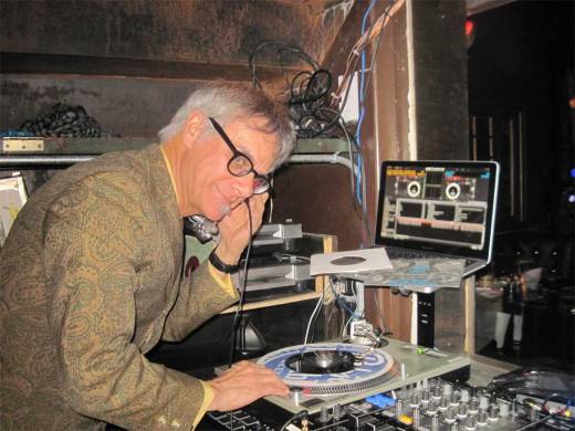 Phast Phreddie the Boogaloo Omnibus deftly uses the laptop to hold his record sleeves as he DJs at Bubble & Squeak.