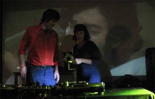 DJs Ambassador Hazy and Bossy Boots consult with each other when spinning 45s at Subway Soul Club.