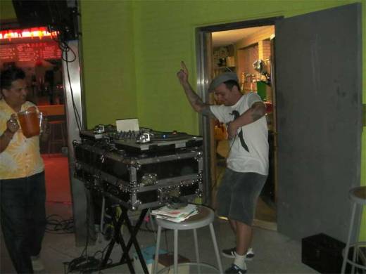 Our pal Tony brings DJ Ratta a beer for his birthday at Shake It Up Sunday!