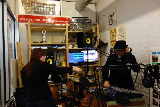 Grace of Spades makes sure the levels are correct as Phast Phreddie the Boogaloo Omnibus cues a record for the "Watch This Sound" show.