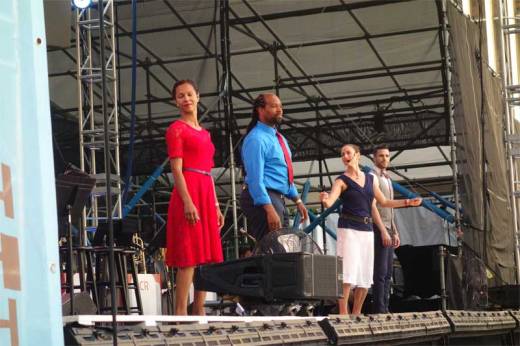 Eva Carrozza leads a crew of dancers as they teach the Lindy hop at Midsummer Night Swing!